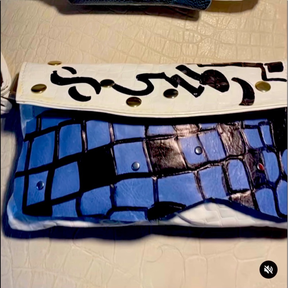 Patton leather 100% Lambskin leather wrist/crossbody clutch